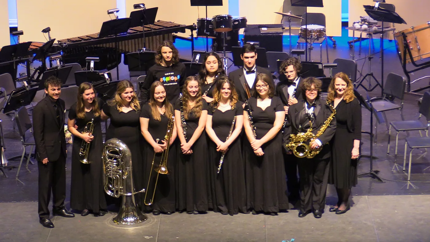 South Lyon student musicians gathered together onstage after a concert
