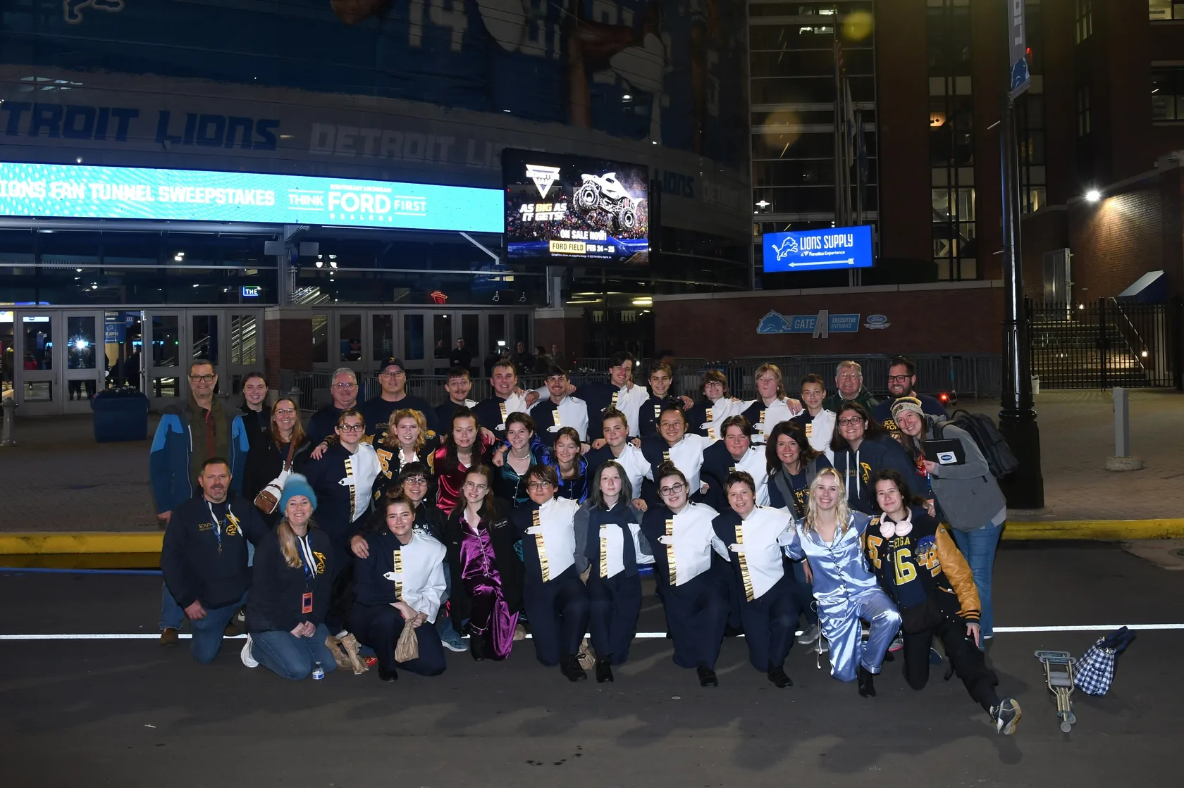 South Lyon band students together outside Ford Field during a 2023 group experience